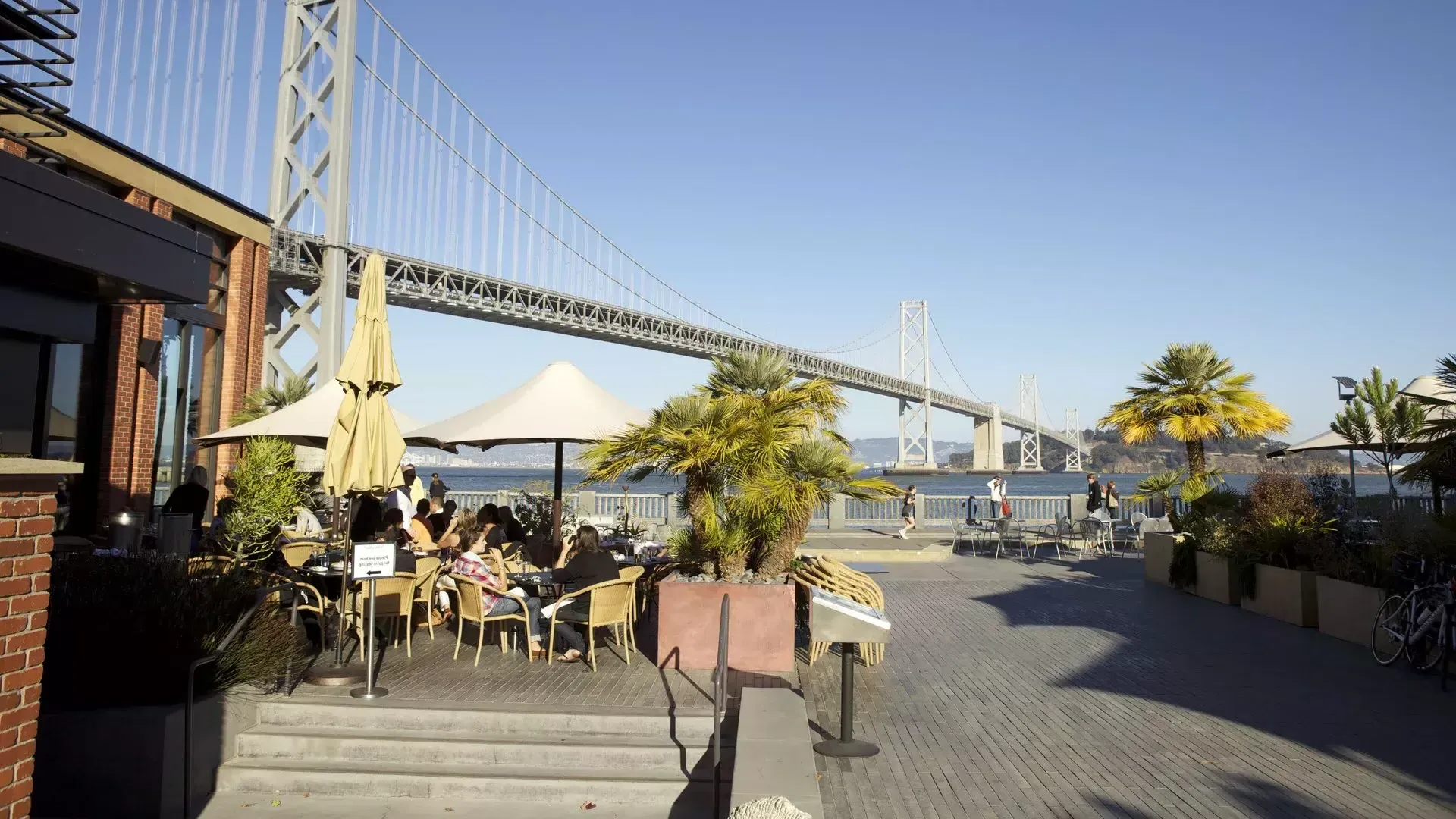 Diners enjoy a meal along the San Francisco waterfront.