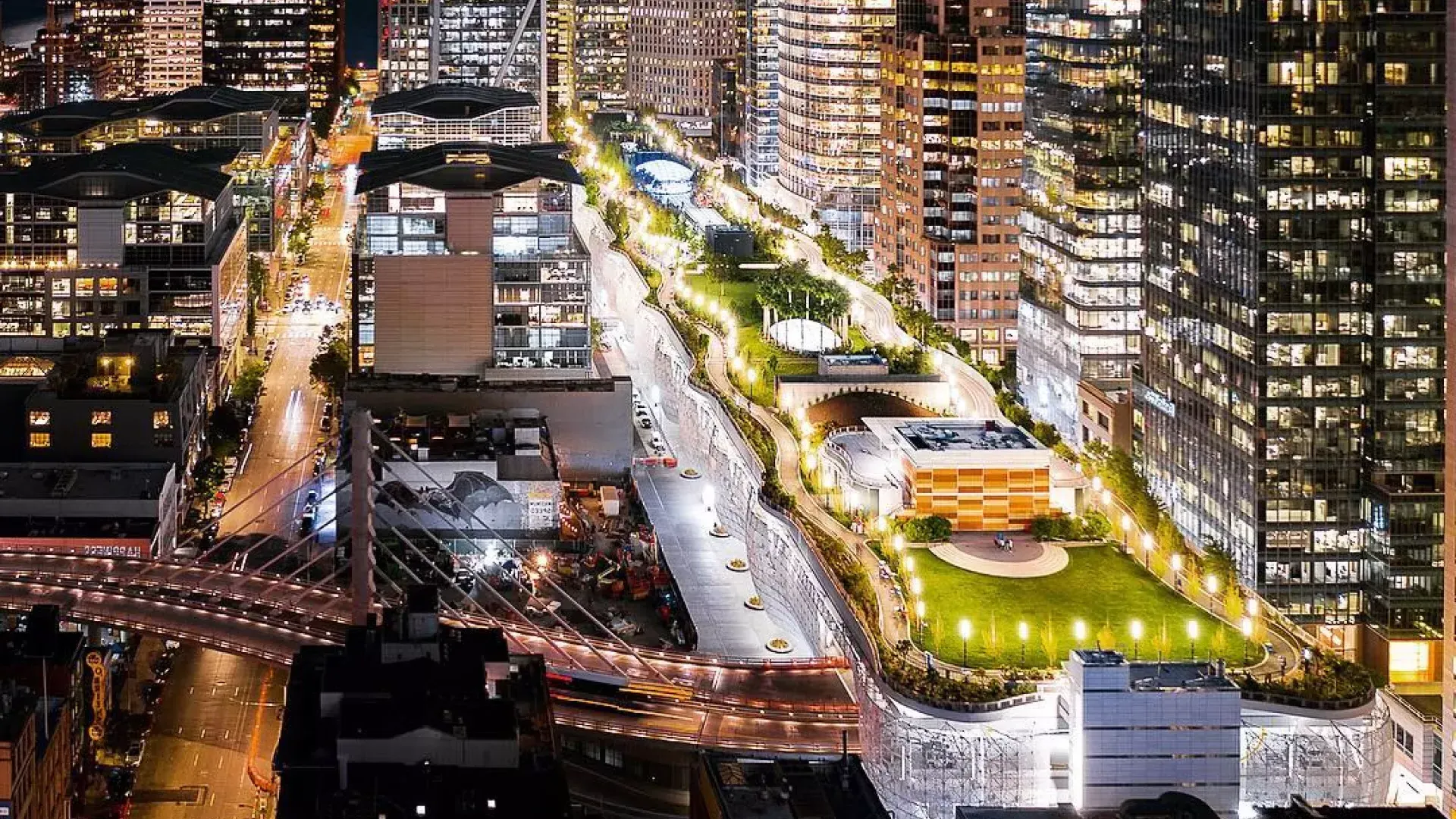 San Francisco's Salesforce Park lit up at night.